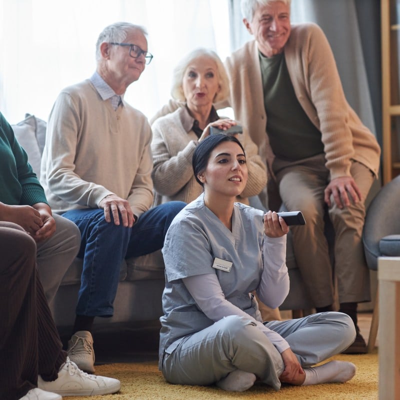 The Timberley | Seniors watching a movie together